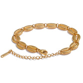 Bracelete Dourado de Aço Inoxidável com Conchas